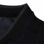 Close-up of the collar on the Tottenham Hotspur Away 2025/26 Fan Version jersey in dark colors.