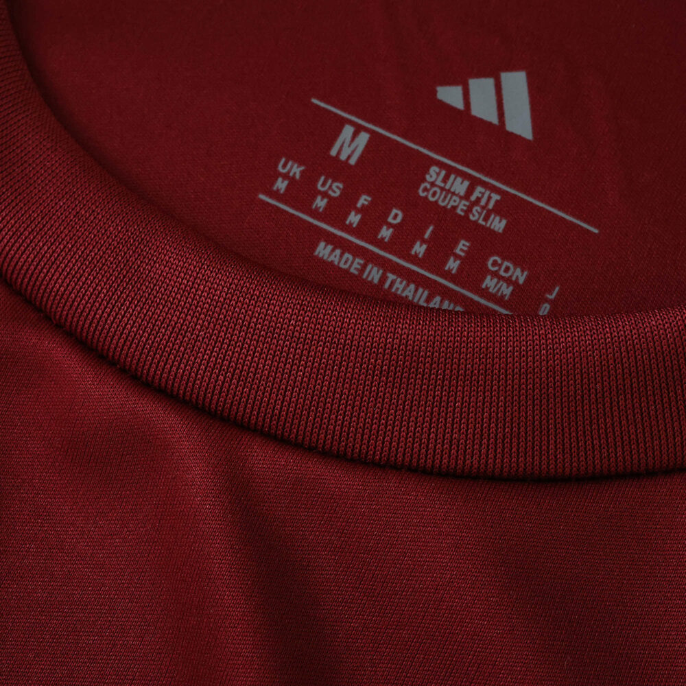Close-up of the collar and size label on the Aston Villa Home 2025/26 Fan Version football shirt.