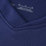 Close-up of the collar and fabric detail on the Atlético Madrid Away 2025/26 Fan Version jersey.