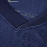 Close-up of the collar on the Atlético Madrid 2025/26 away player version jersey in dark blue.