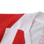 Detail view of the collar and stitching on the Atlético Madrid Home 2025/26 Fan Version jersey.