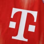 Close-up of the Bayern Munich 2025/26 Home Player Version shirt featuring sponsor logo and club badge.