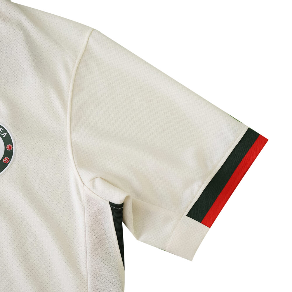 Detail of the right sleeve on the Chelsea Away 2025/26 Fan Version jersey, showing red and black trim.