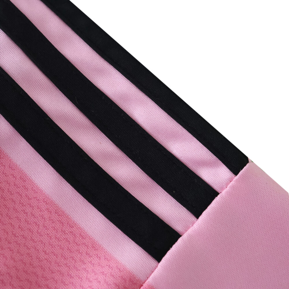 Close-up of the sleeve detail on the Inter Miami CF 2025/26 Home Fan Version jersey, featuring pink fabric and black stripes.