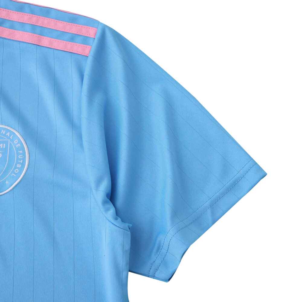 Detail of the Inter Miami CF Third 2025/26 Fan Version jersey showing blue fabric and pink shoulder stripes.