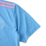 Detail of the Inter Miami CF Third 2025/26 Fan Version jersey showing blue fabric and pink shoulder stripes.