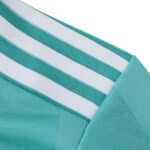 Close-up of the teal Liverpool Third 2025/26 Player Version jersey with white shoulder stripes.