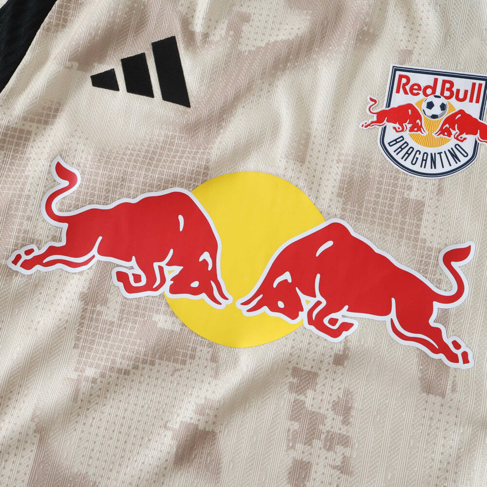 Close-up of New York Red Bulls Away 2025/26 player jersey featuring the Red Bull logo and club badge.