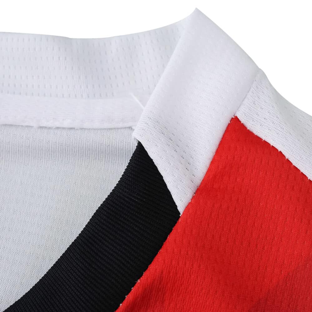 Close-up of the PSV Eindhoven 2025/26 Home Fan Version jersey collar in red, white, and black.