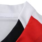 Close-up of the PSV Eindhoven 2025/26 Home Fan Version jersey collar in red, white, and black.