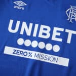 Close-up of the 2025/26 Rangers Home Fan Version jersey featuring sponsor and club logo details.