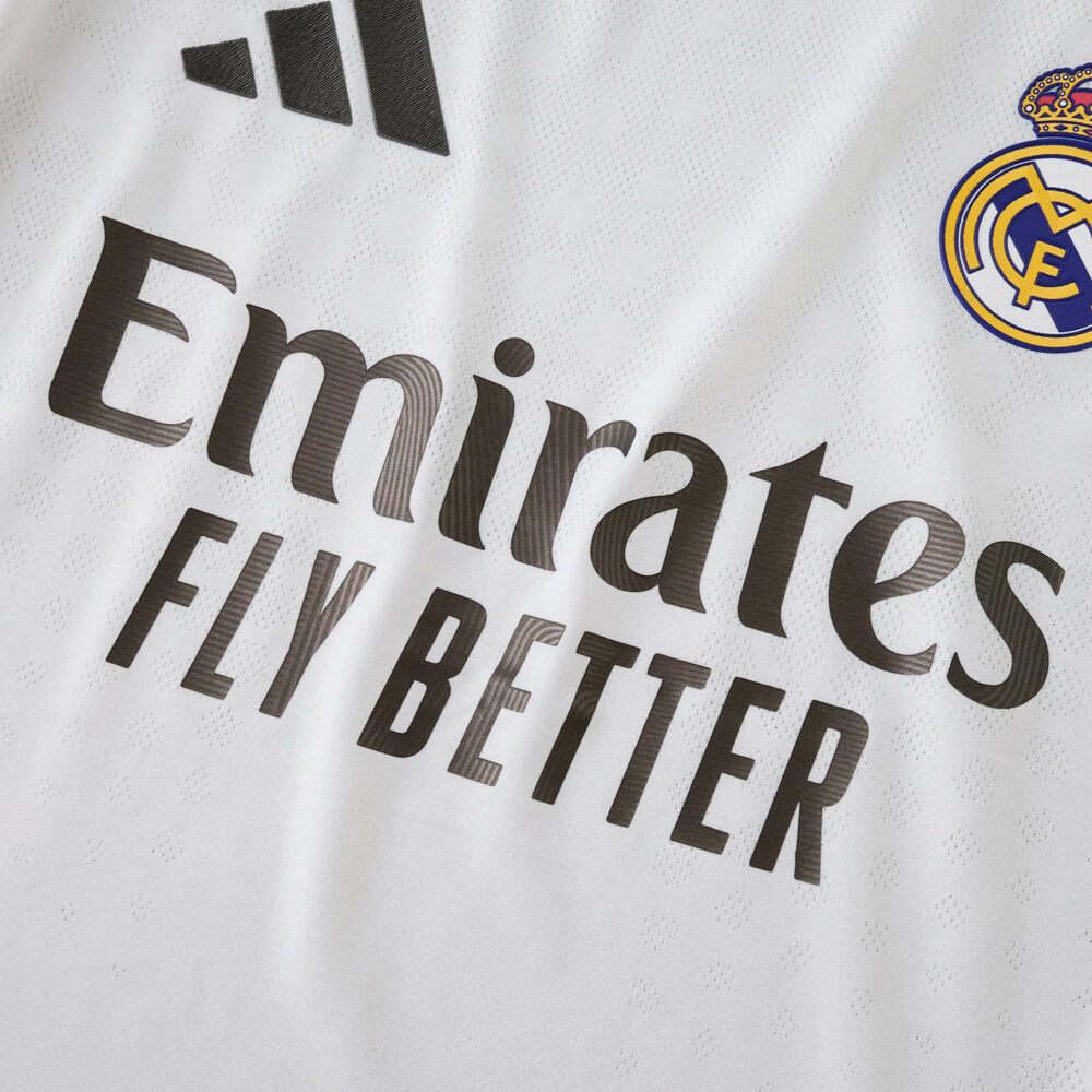 Close-up of the 2025/26 Real Madrid Home Player Version jersey with sponsor and club logo.
