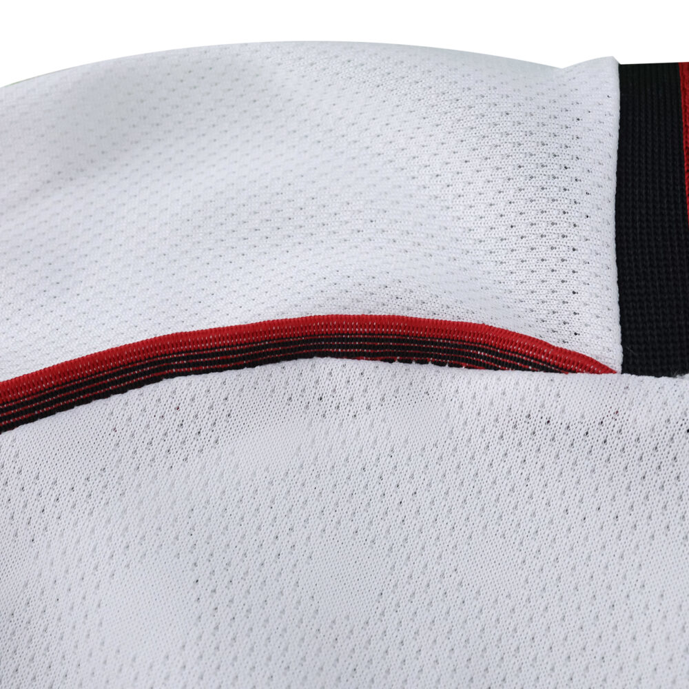 Close-up of the River Plate Home 2025/26 Player Version jersey fabric and collar details.