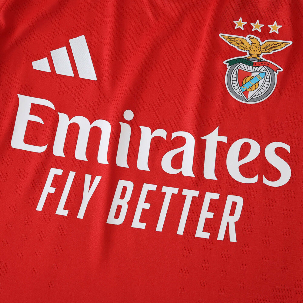 Close-up of SL Benfica Home 2025/26 Player Version jersey featuring club crest and sponsor logo.