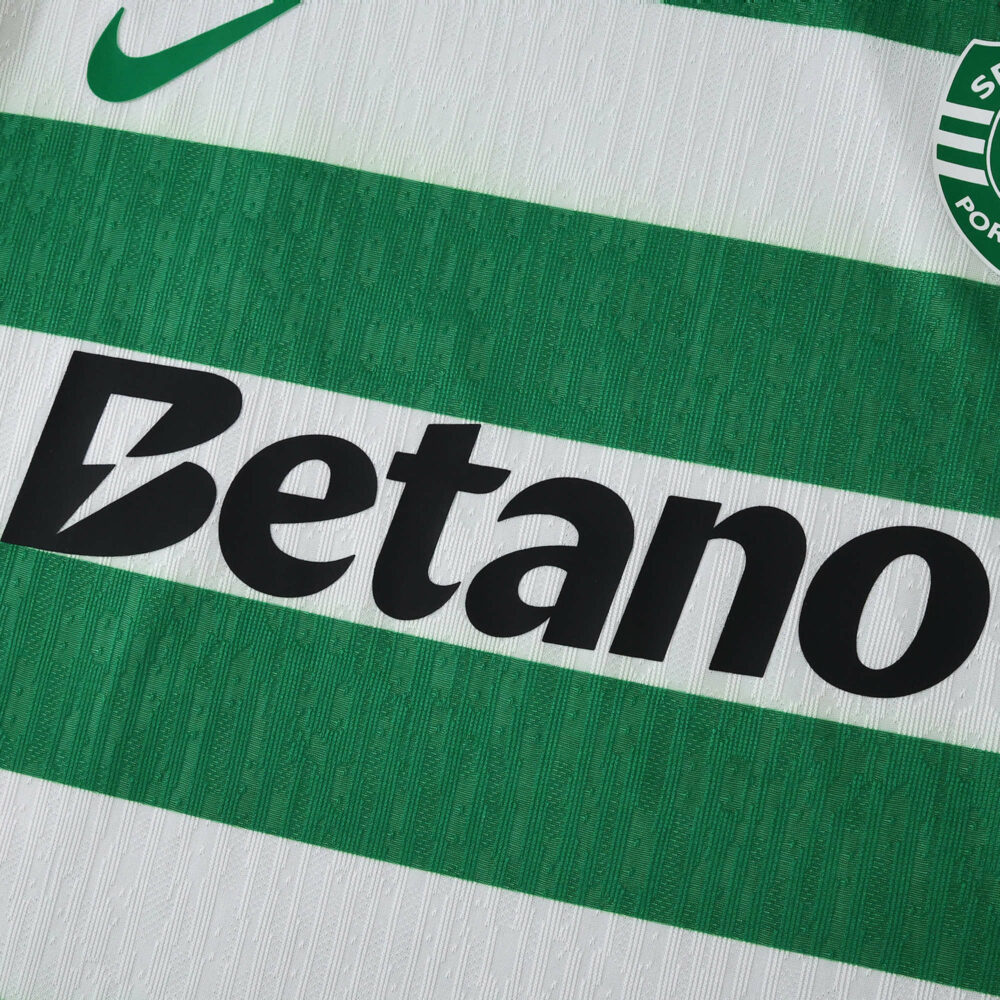 Close-up of Sporting CP 2025/26 Home player version jersey, featuring sponsor logo and green hoops.