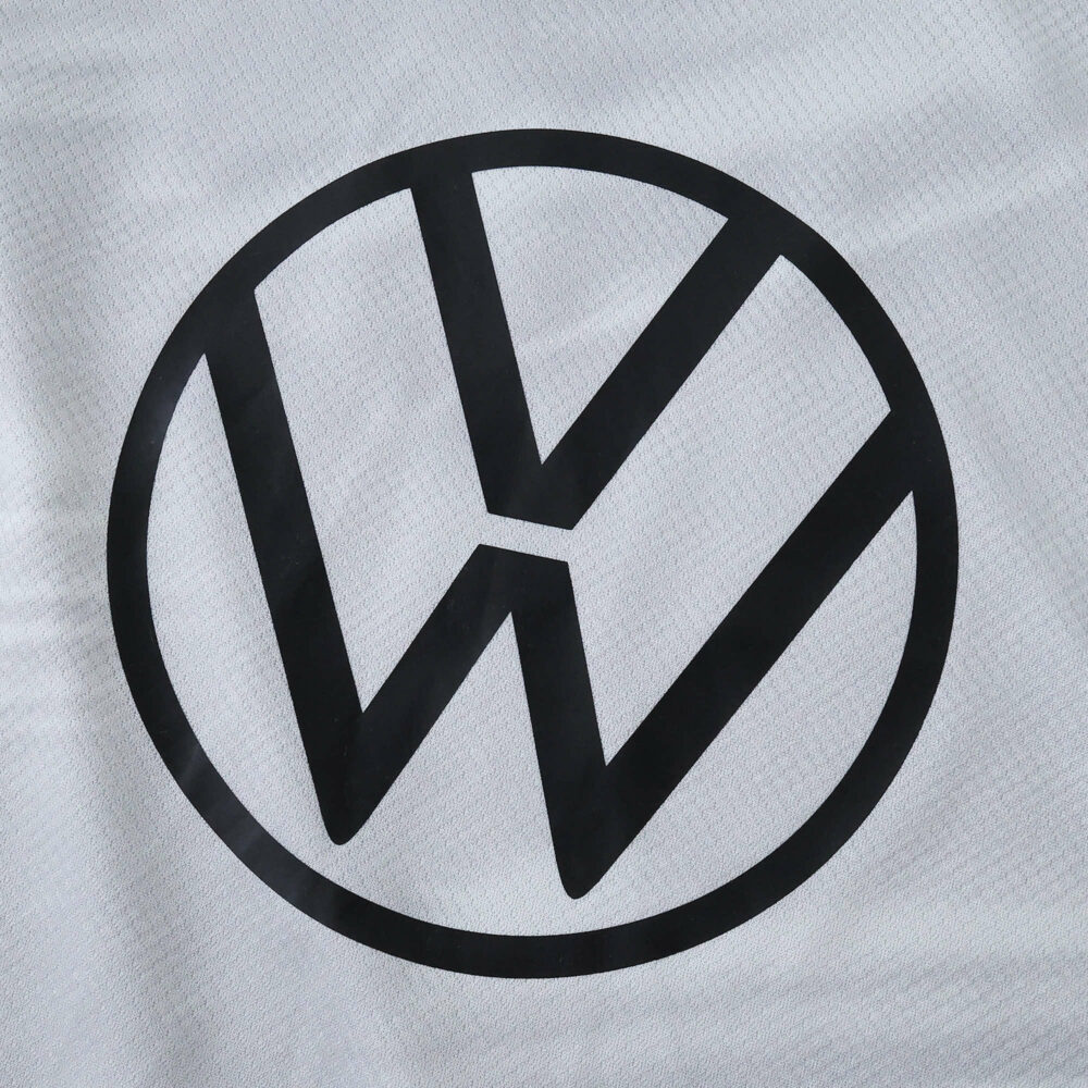 Volkswagen logo on the VfL Wolfsburg Away 2025/26 Fan Version jersey fabric.