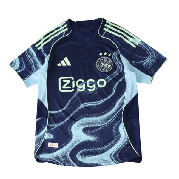 Ajax Away 2025/26 Player Version jersey in navy with light blue wave patterns and Ziggo sponsor logo.