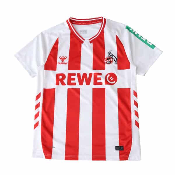 FC Köln 2025/26 home fan jersey with red stripes, team logo, and REWE sponsor on the front.