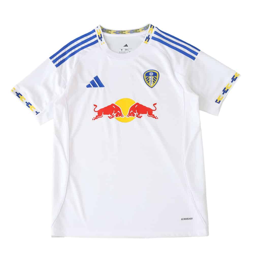 Leeds United 2025/26 home fan jersey in white with blue stripes, club crest, and Red Bull sponsor logo.