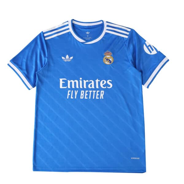 Real Madrid 2025/26 third kit fan version in blue with white trim, Adidas and sponsor logos on front.
