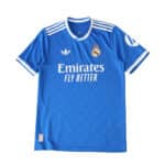 Real Madrid 2025/26 Third Player Version jersey in blue with white accents, club crest, and sponsor logo.