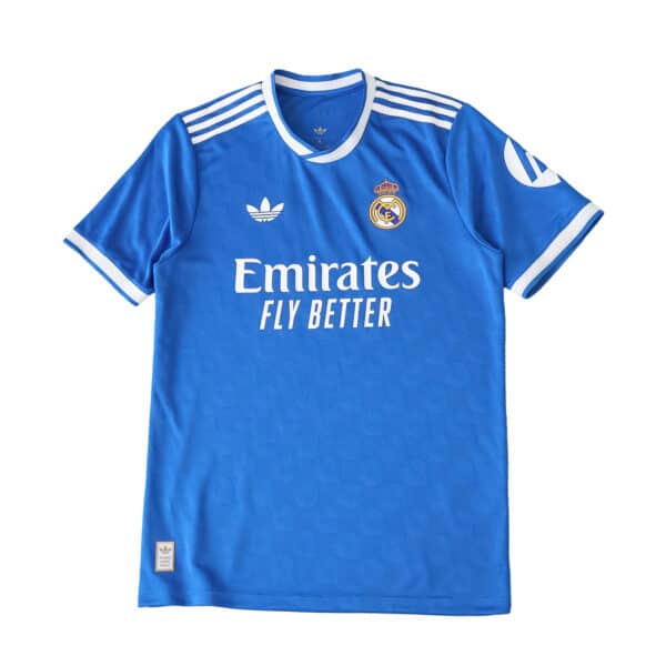 Real Madrid 2025/26 Third Player Version jersey in blue with white accents, club crest, and sponsor logo.
