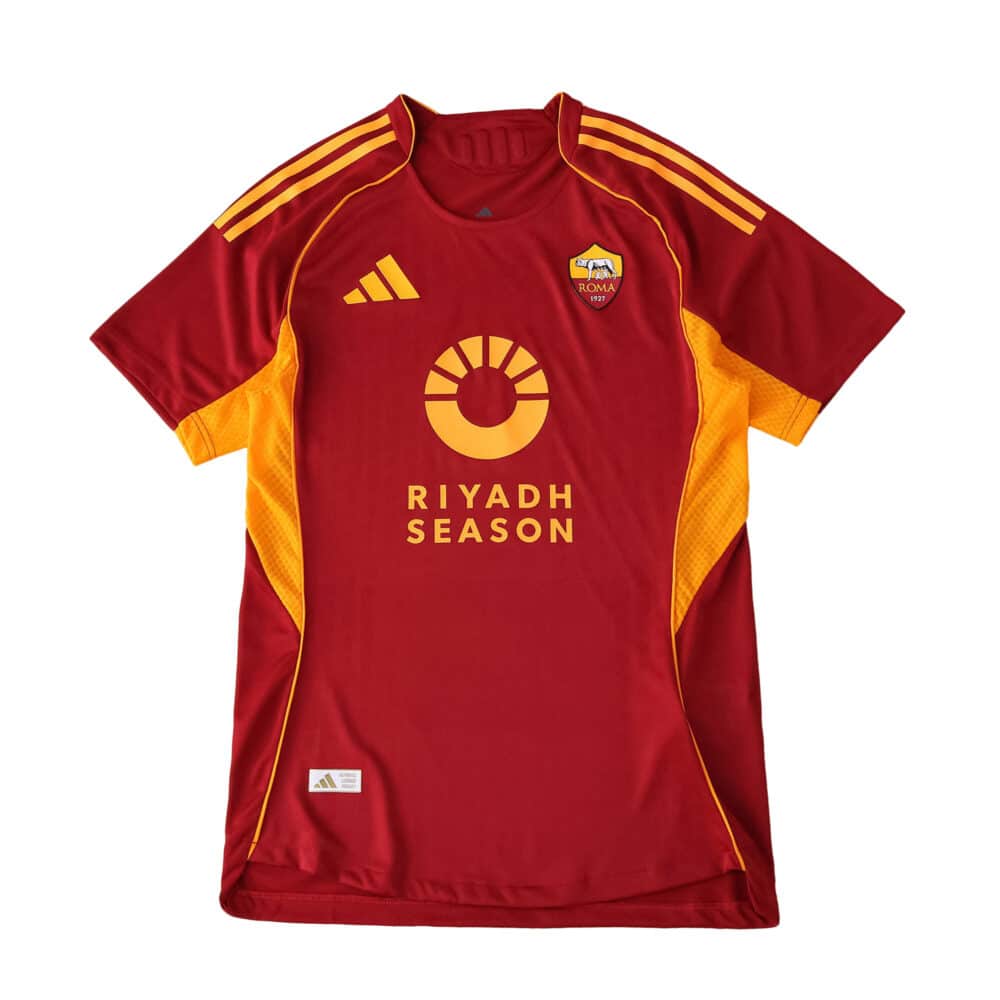 Roma Home 2025/26 Player Version jersey in red with yellow accents, Adidas and Riyadh Season logos.