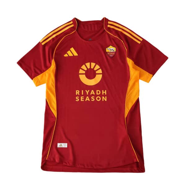 Roma Home 2025/26 Player Version jersey in red with yellow accents, Adidas and Riyadh Season logos.