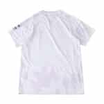 Back view of the Manchester United 2025/26 Away Fan Version jersey in white with subtle purple patterns.