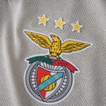SL Benfica 2025/26 Away Player Version jersey featuring club crest and three gold stars on fabric.