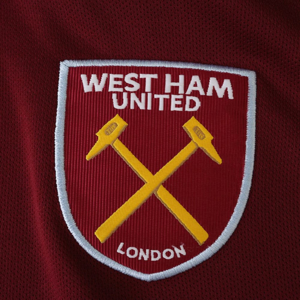 West Ham United 2025/26 Home Fan Version jersey with embroidered club crest on claret fabric.