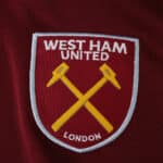West Ham United 2025/26 Home Fan Version jersey with embroidered club crest on claret fabric.