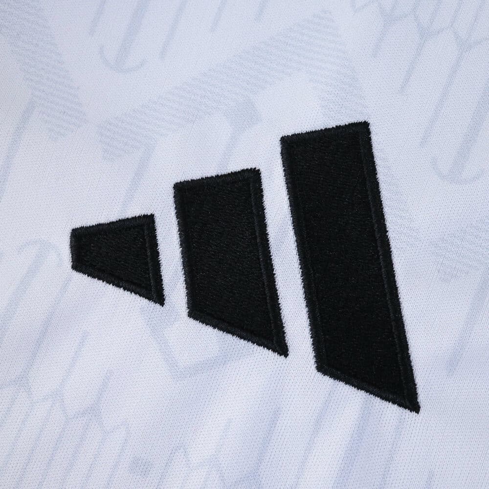 Close-up of the black adidas logo on the 2025/26 Fulham Home Fan Version jersey.