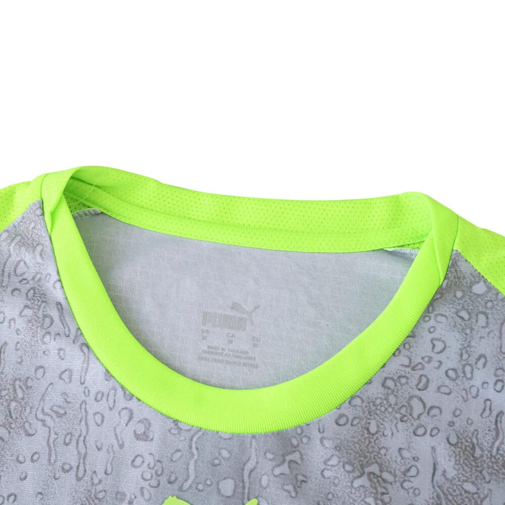 Close-up of Manchester City Third 2025/26 Player Version jersey collar with neon green trim.