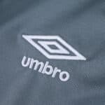 Close-up of the white Umbro logo embroidered on the Rangers Third 2025/26 Fan Version jersey fabric.