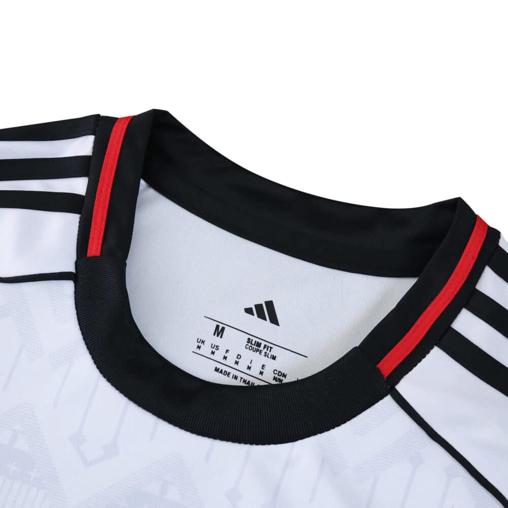 Close-up of Fulham Home 2025/26 Fan Version jersey collar with black, white, and red accents.