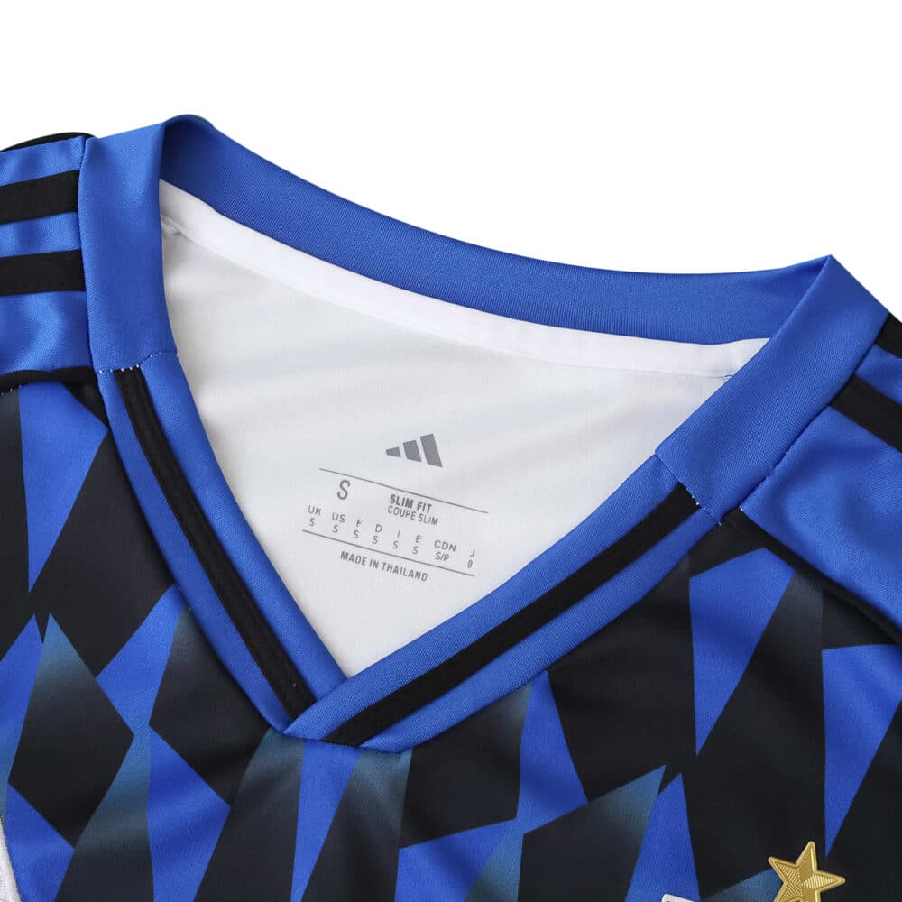 Close-up of the Hamburger SV 2025/26 Home Fan Version jersey collar with Adidas logo and geometric pattern.