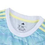 Close-up of Juventus Away 2025/26 Fan Version collar with Adidas logo and size details.