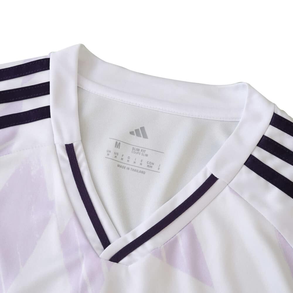 Close-up of the 2025/26 Manchester United Away Fan Version jersey collar with adidas logo and stripes.