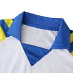 Close-up of the collar and upper chest of the Parma Third 2025/26 Fan Version jersey in blue, yellow, and white.