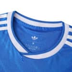 Close-up of the Real Madrid 2025/26 Third Fan Version jersey collar in blue with white trim and Adidas stripes.