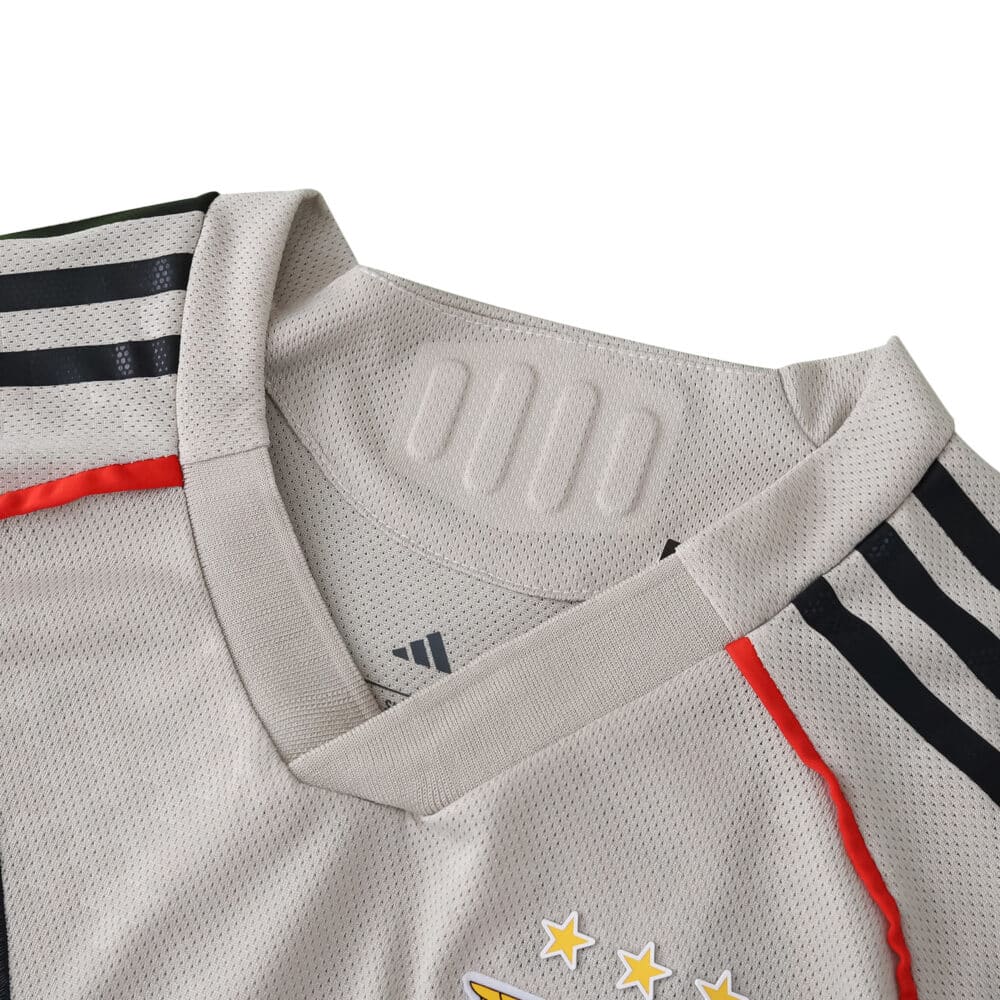 Close-up of SL Benfica Away 2025/26 Player Version jersey collar and shoulders, featuring Adidas stripes.
