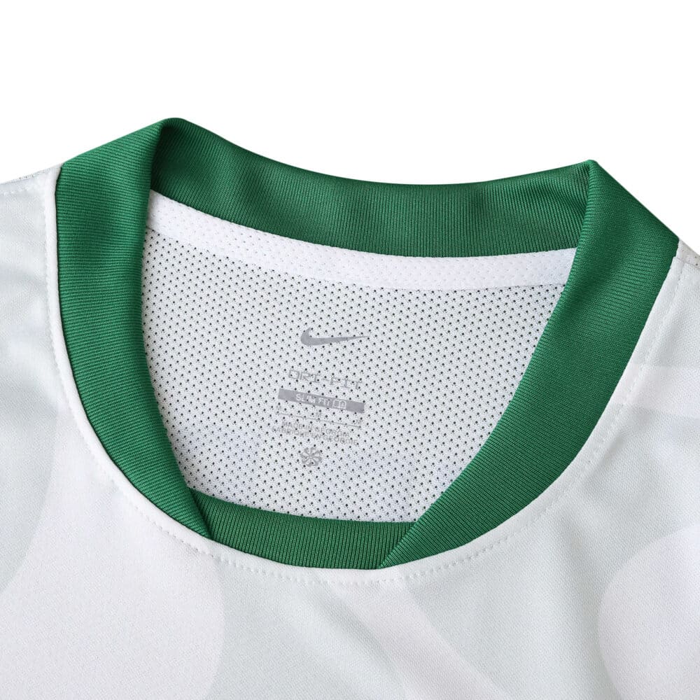 Close-up of the collar on the Sporting CP Away 2025/26 Fan Version jersey, featuring green and white details.