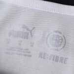 Close-up of the inner collar on the Parma Home 2025/26 Fan Version jersey with Puma and Re:Fibre logos.