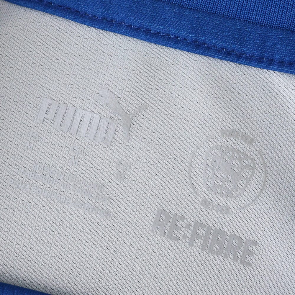 Close-up of the inner collar label on the Parma Third 2025/26 Fan Version shirt, showing Puma and Refibre logos.