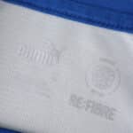 Close-up of the inner collar label on the Parma Third 2025/26 Fan Version shirt, showing Puma and Refibre logos.