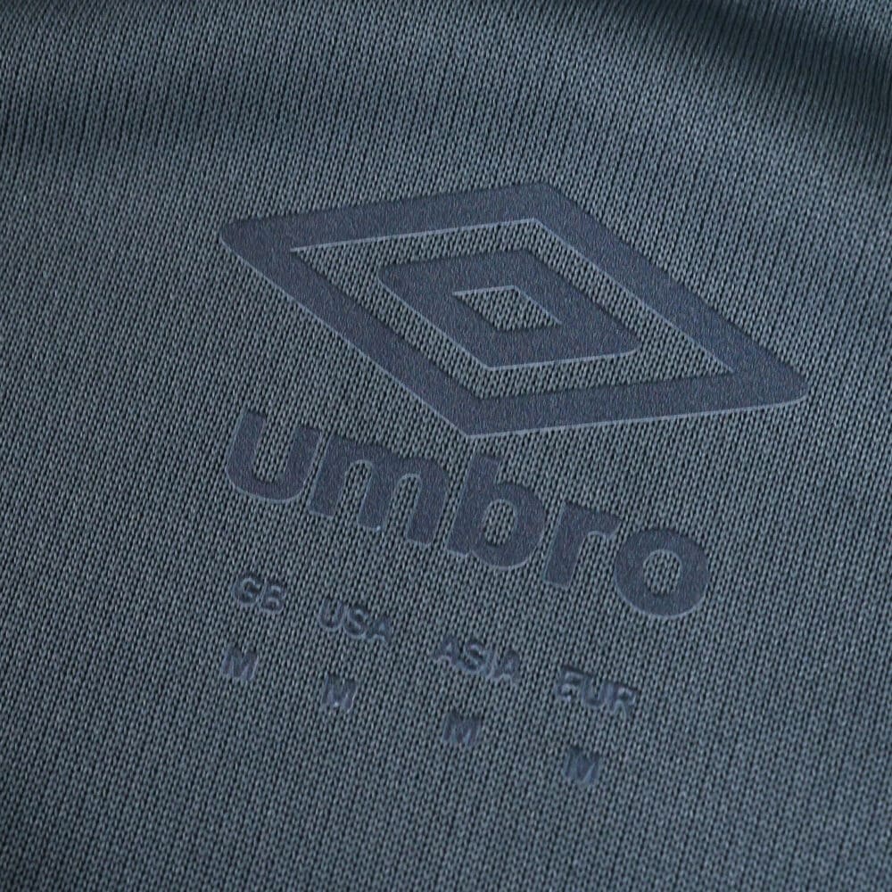 Close-up of the embossed Umbro logo on the Rangers Third 2025/26 Fan Version jersey fabric.