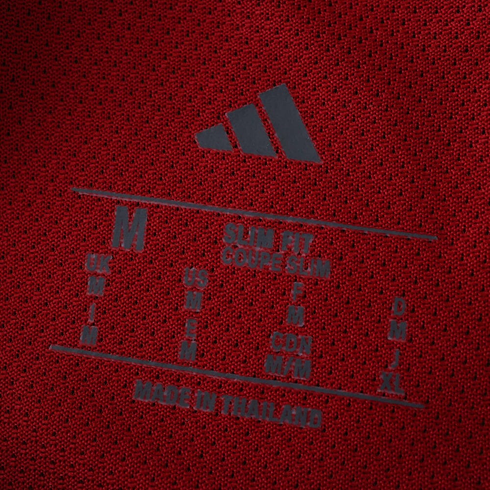 Close-up of the inside collar label on the 2025/26 Roma Home Player Version jersey, showing size and adidas logo.