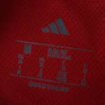 Close-up of the inside collar label on the 2025/26 Roma Home Player Version jersey, showing size and adidas logo.