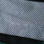 Close-up of Sporting CP Third 2025/26 Fan Version jersey tag showing Nike logo and size details on mesh fabric.